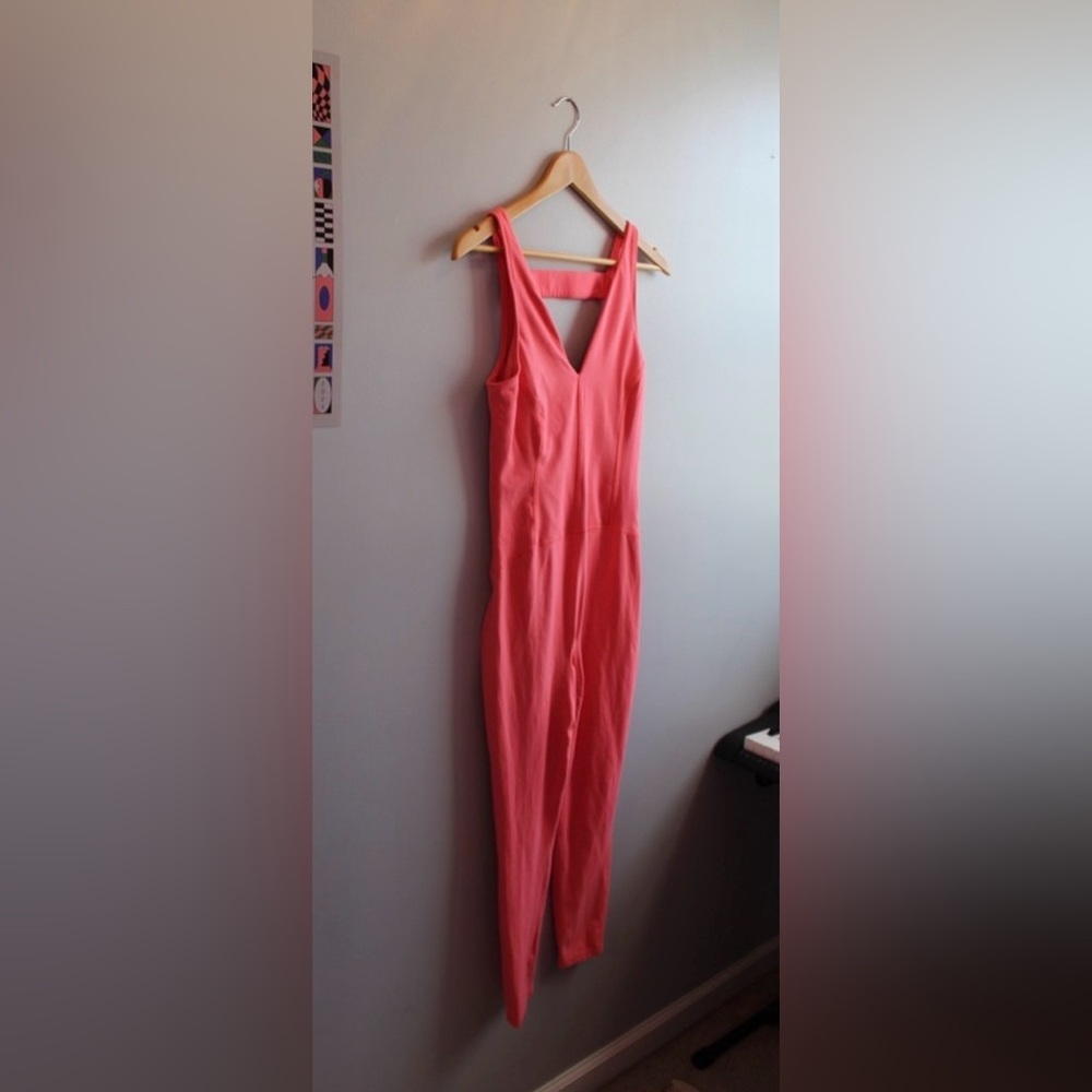 Free People Movement Never Better Jumpsuit, w/ strap back, Neon Coral, Small